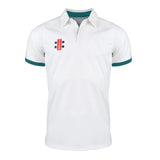 The Gray Nicolls Pro Performance V2 S/S Cricket Shirt is a white, slim fit top with a British collar, teal sleeve trim, breathable punch hole technology, and a small red, black, and white logo on the left chest.