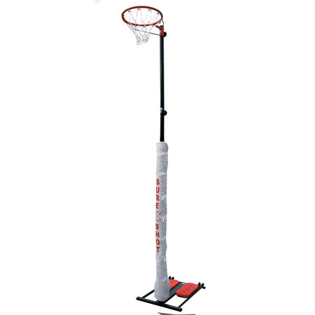The Sure Shot Netball Pole Padding features weather-resistant padding labeled Sure Shot, a red hoop, white net, and a black base with red weights.