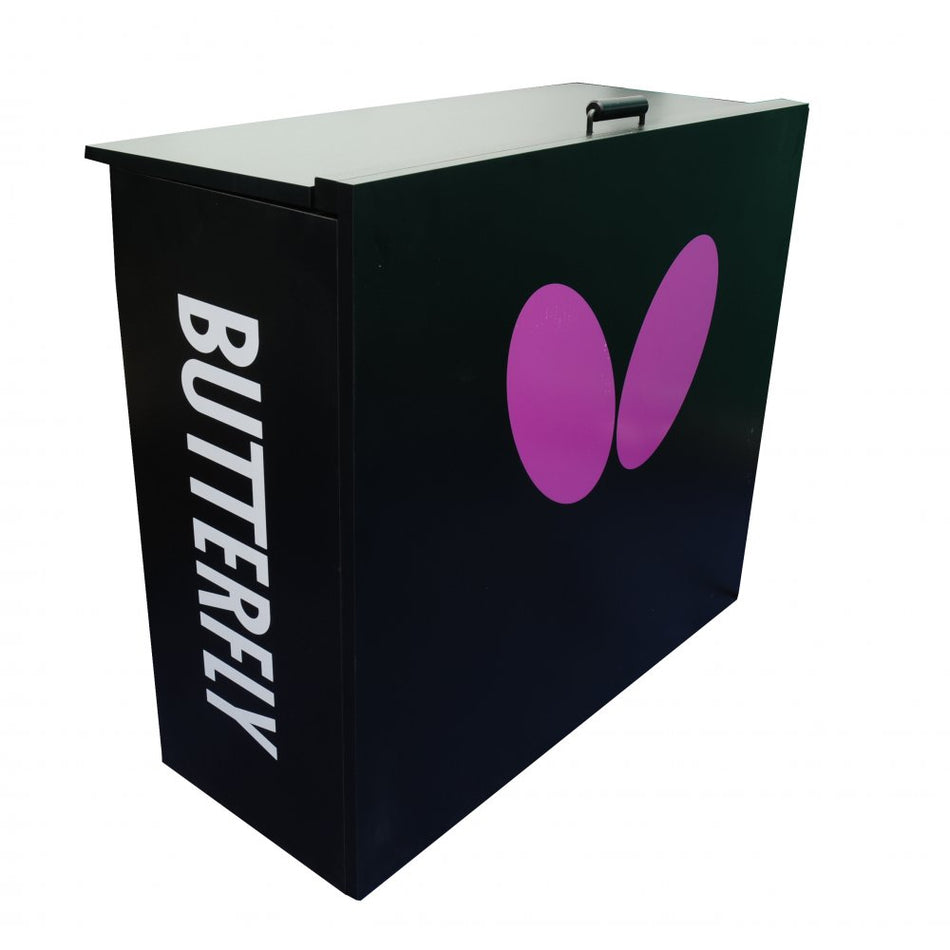 The Butterfly Table Tennis Umpire Table by Butterfly is black and rectangular with a top handle, features the white "BUTTERFLY" brand on the side, and displays two large pink ovals as the Butterfly logo on the front.