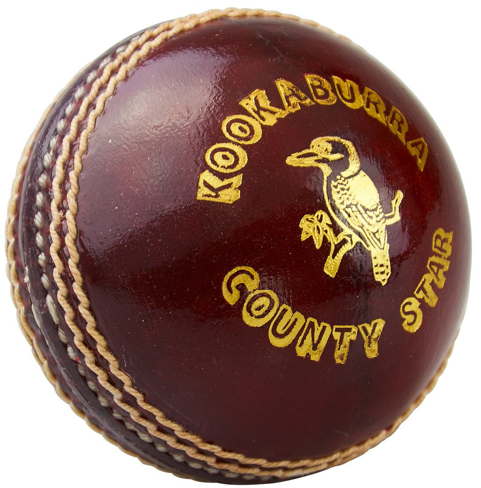 The Kookaburra County Star Cricket Ball features dark red leather, stitched seams, gold text, and a kookaburra logo. Durable and ideal for matches or training, this official Kookaburra product is perfect for serious cricketers.