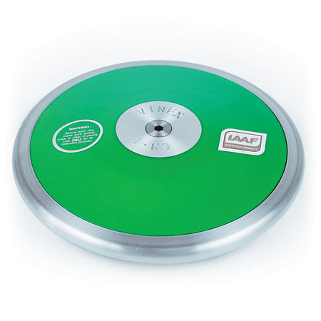 The Mastersport Club Discus is a green and silver steel rim discus with a 1 KG central metal plate, warning and certification labels, designed for athletic throwing events.