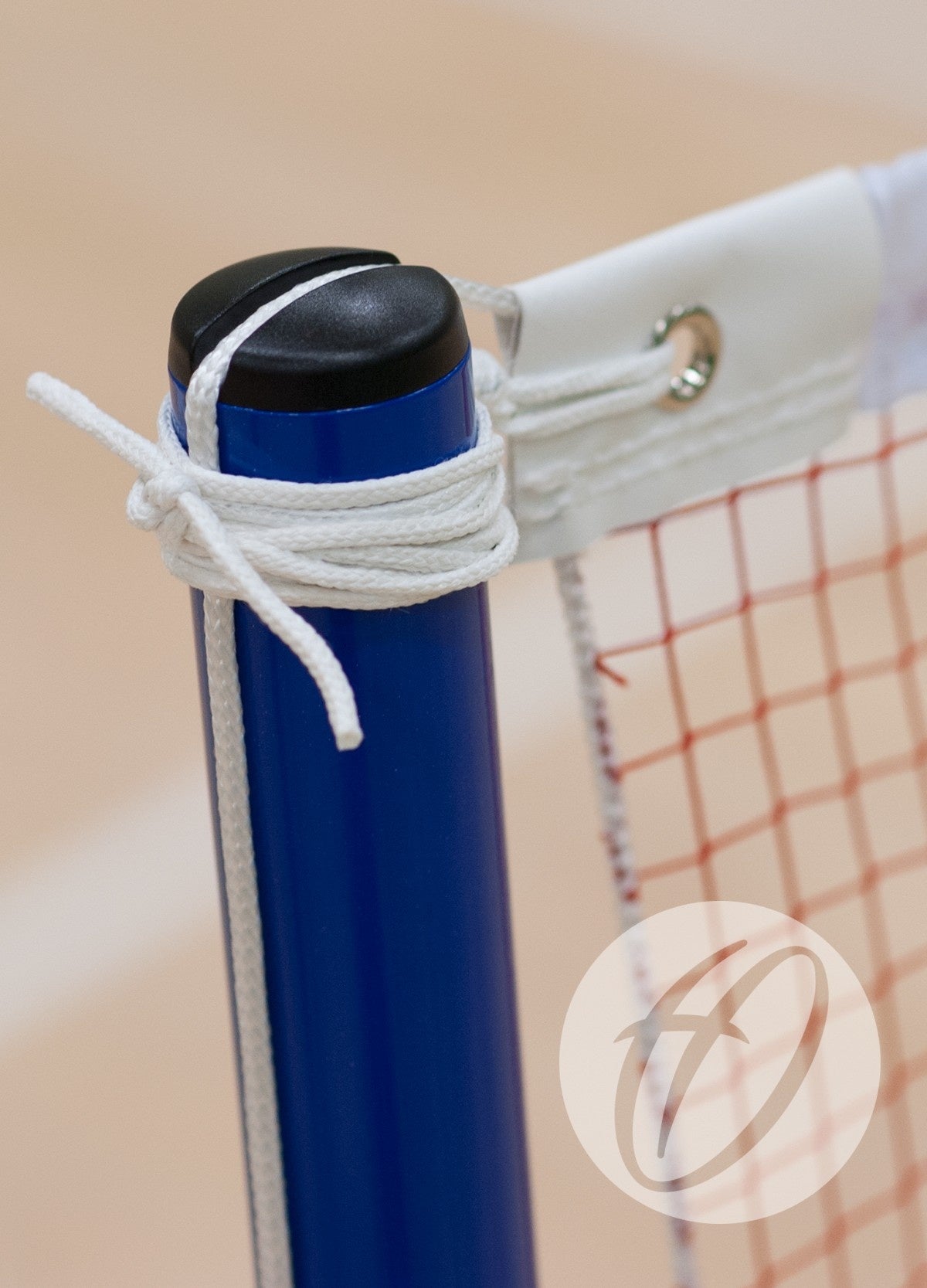 Close-up of a blue Harrod Sport School Wheelaway Training Post from a portable net system. The red mesh net has white trim and metal grommets, secured by a white string—ideal for schools and clubs.