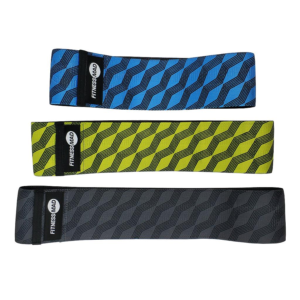 The Fitness Mad Squat Band Set of 3 includes blue, yellow, and black non-slip resistance bands with a zigzag pattern and branded label—perfect squat bands for your next glute workout.