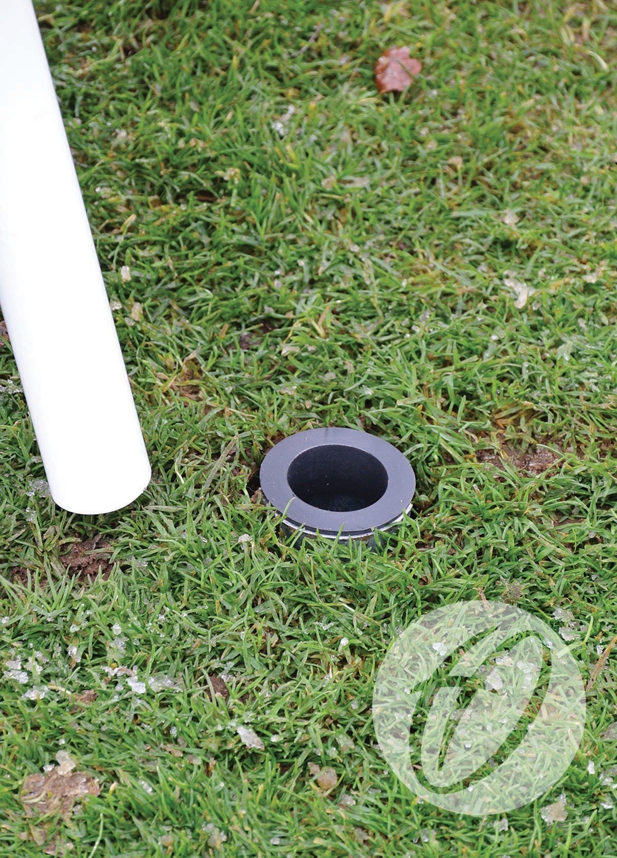The Harrod Sport Turf Screw Socket & Cap provides a secure solution for fixture installation with a hole in the grass ready for this turf screw socket system.
