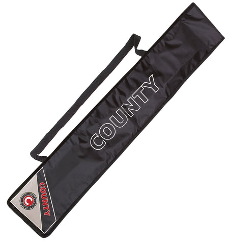 The Hunts County Padded Bat Cover is a black rectangular cover with COUNTY in bold white letters, a shoulder strap, and a triangular Hunts County section with COUNTY and logo on the bottom corner for cricket bat protection.