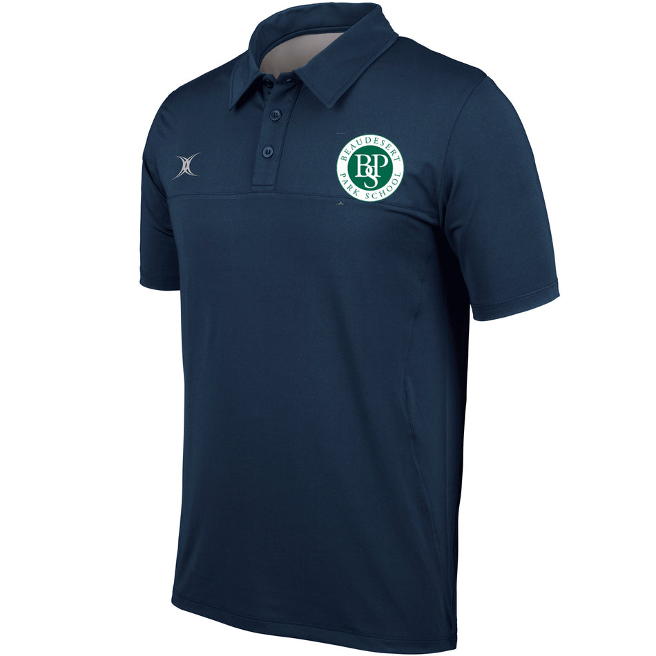 The Gilbert Beaudesert Park School Pro Tech Polo Shirt in navy features a collar, buttoned placket, moisture management, the school's green and white logo on the left chest, and a small white emblem on the right shoulder.