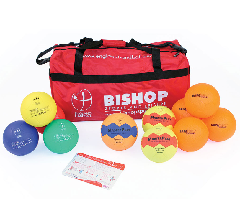 The Mastersport England Handball Foundation Kit includes a red duffle bag and colorful handballs in yellow, blue, orange, and purple, plus an instruction card. Both the bag and SoftTouch handballs display the England Handball logo.
