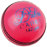 The Dukes Cadet A Cricket Ball (Junior - Pink) features shiny pink premium leather, black stitching, and “Dukes Cadet 142 gm” blue text—perfect as a junior cricket ball.