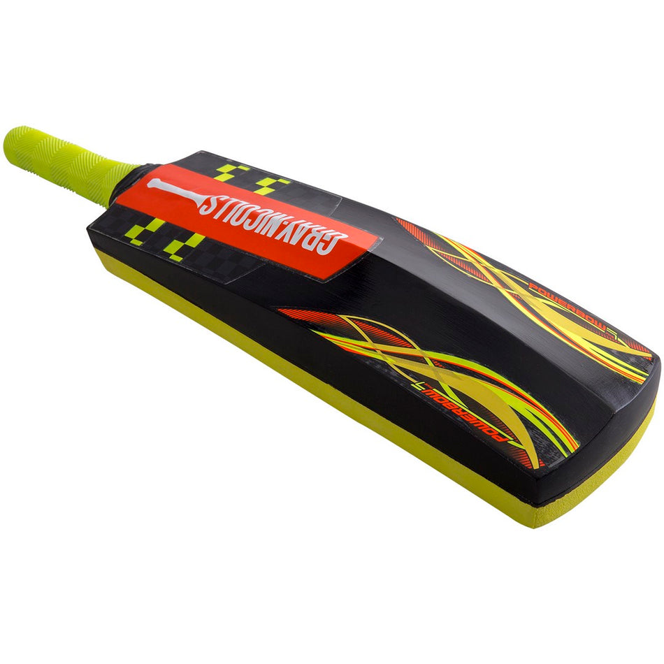 A close-up of the Gray Nicolls Cloud Catcher Light Cricket Bat highlights its neon green handle and bold black, yellow, and red blade design with STORM KING in white—ideal for players seeking a lightweight Gray Nicolls bat.