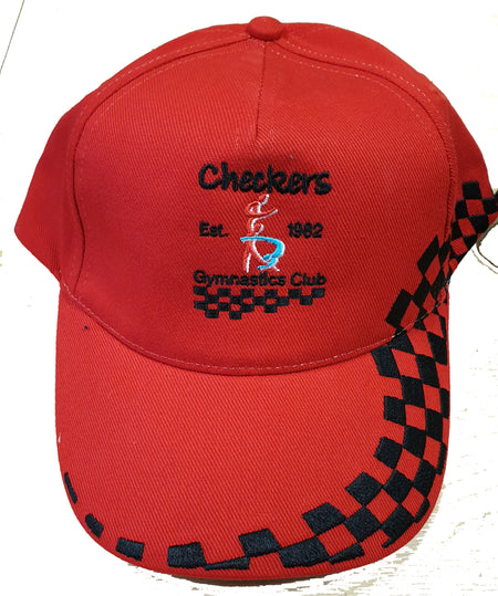 The Checkers Gymnastics Cap by Martin Berrill Sports is a red cotton drill cap with black checkered patterns, embroidered "Checkers Gymnastics Club Est. 1982" text, and a stylized gymnast figure. Adjustable and perfect for fans.