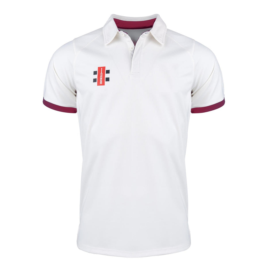 The Gray Nicolls Pro Performance V2 S/S Cricket Shirt is a white, slim fit shirt with short sleeves, a maroon collar and sleeve trim, and a small rectangular logo with black, white, and red elements on the left chest.