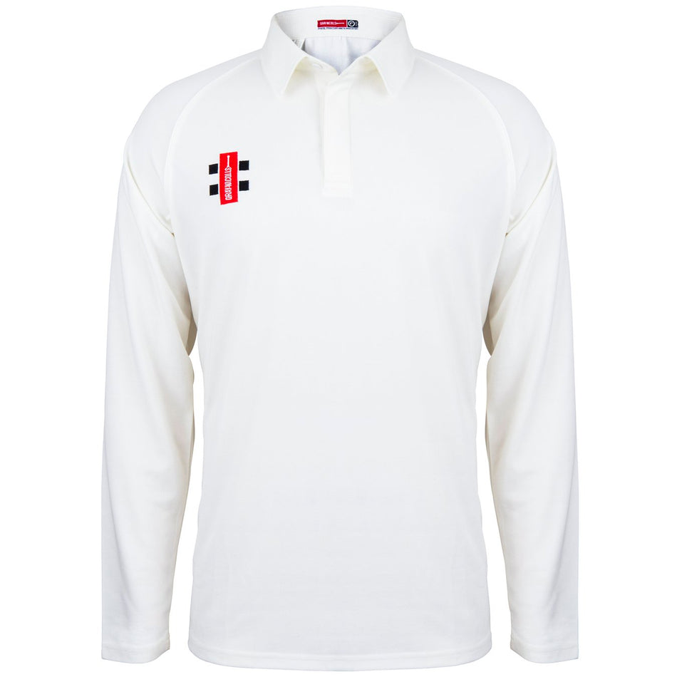 The Gray Nicolls Rockhampton CC Matrix V2 Junior Long Sleeved Playing Shirt is a breathable white cricket top with a collar and a small red, black, and white logo on the left chest. The shirt is plain with no extra patterns or designs.