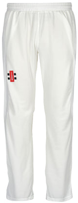 A pair of Gray Nicolls Velocity Cricket Trousers in white, showing a red and black logo on the left thigh, displayed against a plain white background.