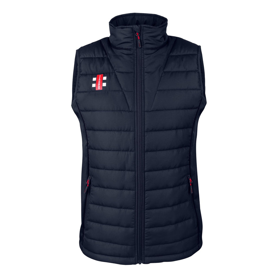 The Gray Nicolls Penallt & Redbrook CC Pro Performance Bodywarmer is a sleeveless navy blue quilted vest with a high collar, front zipper, two side pockets, water-repellent finish, and a small red/white logo on the upper left chest.