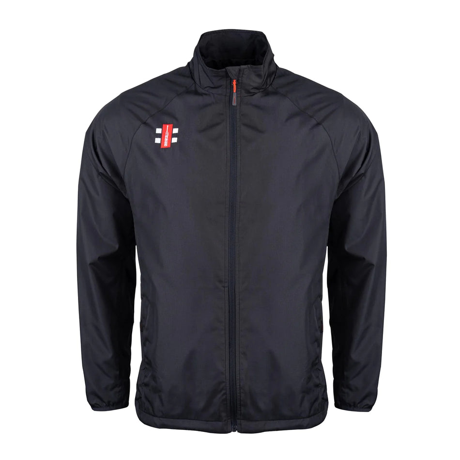 The Gray Nicolls Rockhampton CC Velocity Rain Jacket - Junior is a black, water-repellent zip-up with long sleeves, two front pockets, and a red and white chest logo—perfect as a stylish cricket jacket for unpredictable weather.
