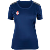 The Gray Nicolls Pro Performance Ladies T-Shirt is a navy activewear top with gray shoulder panels and a small red and white logo on the left chest, designed for moisture wicking—ideal for intense training. Shown on a white background.