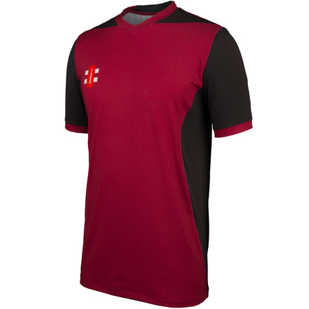 The Gray Nicolls T20 Shirt Short Sleeve features a maroon front, black sides and sleeves, maroon accents on the collar and cuffs, and a small white and red Gray Nicolls logo on the upper left chest.