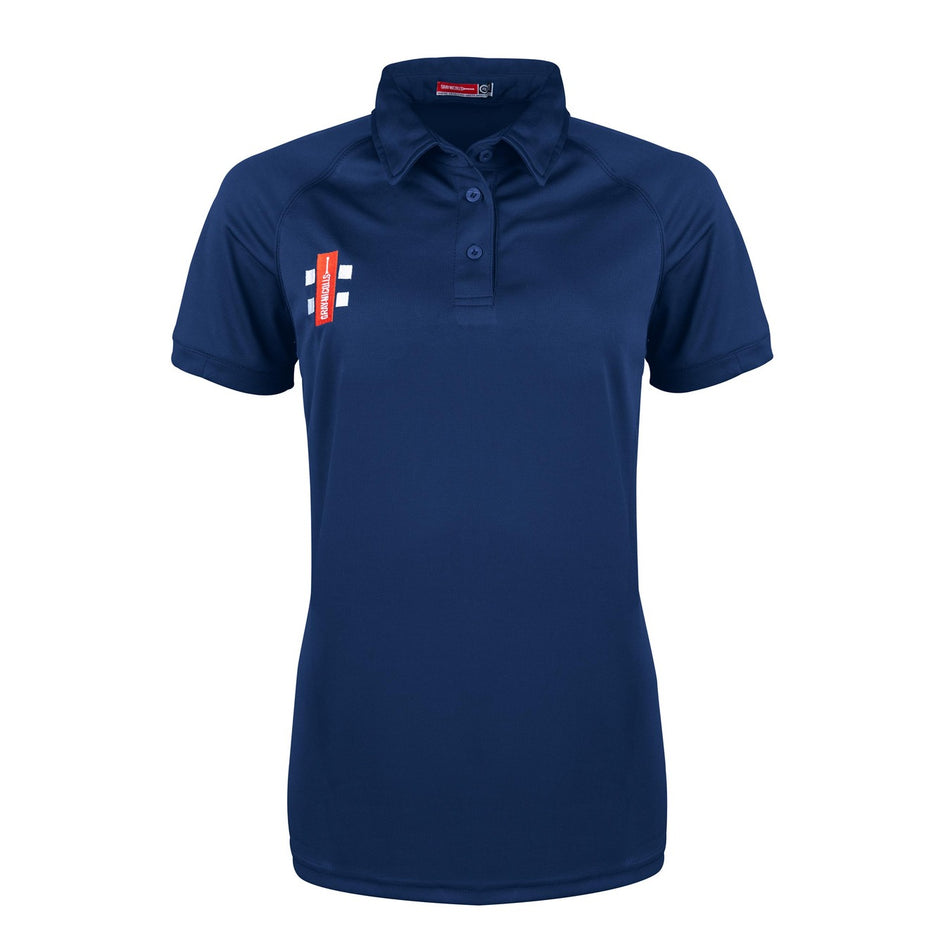 The Gray Nicolls Matrix V2 Ladies Polo Shirt is a navy slim fit, short-sleeve polo with a collar and three buttons. It has a small red and white rectangular logo on the left chest and is shown against a plain white background.