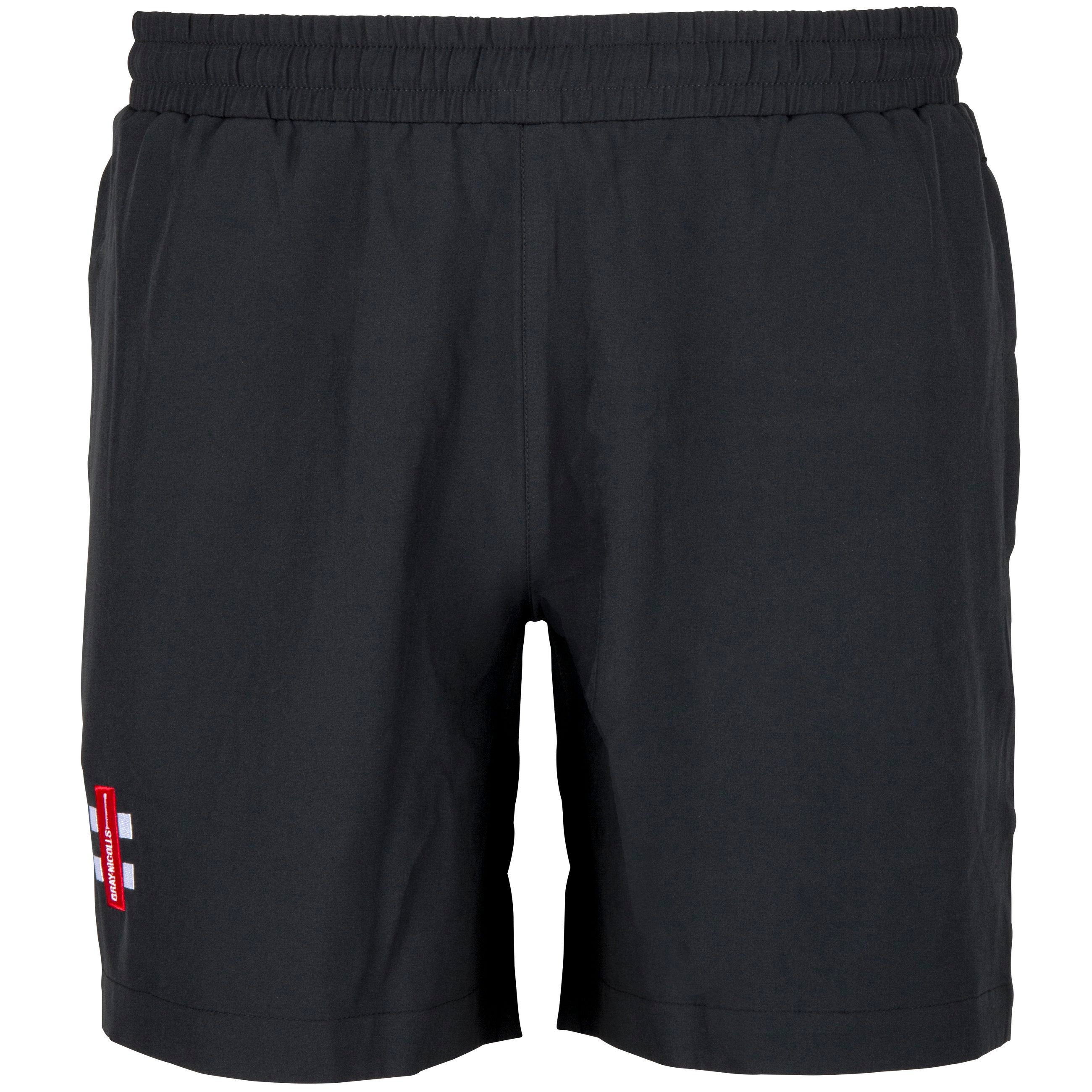 The Martin Berrill Sports National Star College CC Black Training Shorts feature an elastic waistband, side pockets, and a red and white patch with text and cross on the lower left leg—ideal minimalist cricket shorts for comfort and performance.