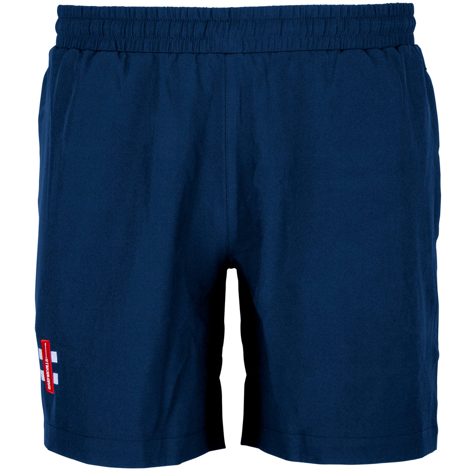 The Gray Nicolls Hatherley & Reddings CC Junior Training Shorts are navy blue with an elastic waistband, side pockets, and a red and white patch on the lower left leg—ideal for active days with their sporty, simple design.