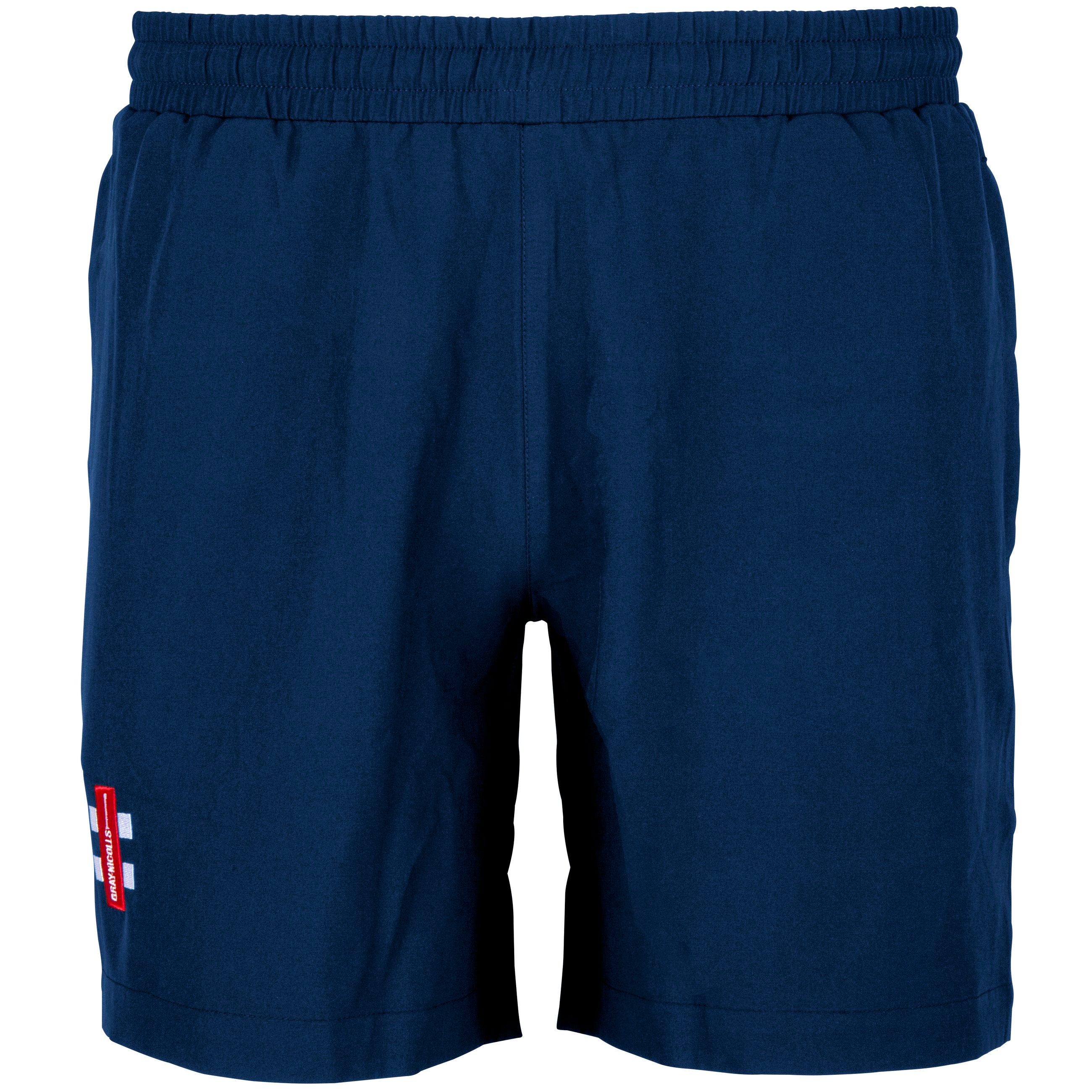 The Gray Nicolls Monmouth CC Junior Dark Navy Training Shorts feature an elastic waistband, side pockets, and a small red and white logo patch—offering a simple, sporty design perfect for cricket training.