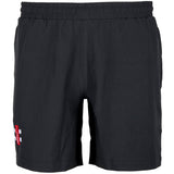 The Gray Nicolls Rockhampton CC Velocity Shorts - Senior are black athletic cricket shorts with an elastic waistband, side pockets, and a small red and white rectangular logo on the left leg near the hem, shown against a white background.