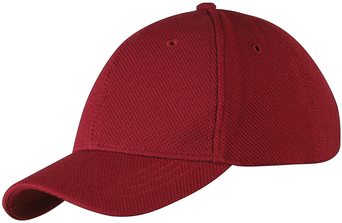 The Gray Nicolls Cricket Cap by Gray Nicolls is a maroon polyester cap with a curved brim, visible stitching, and textured fabric, displayed against a white background.