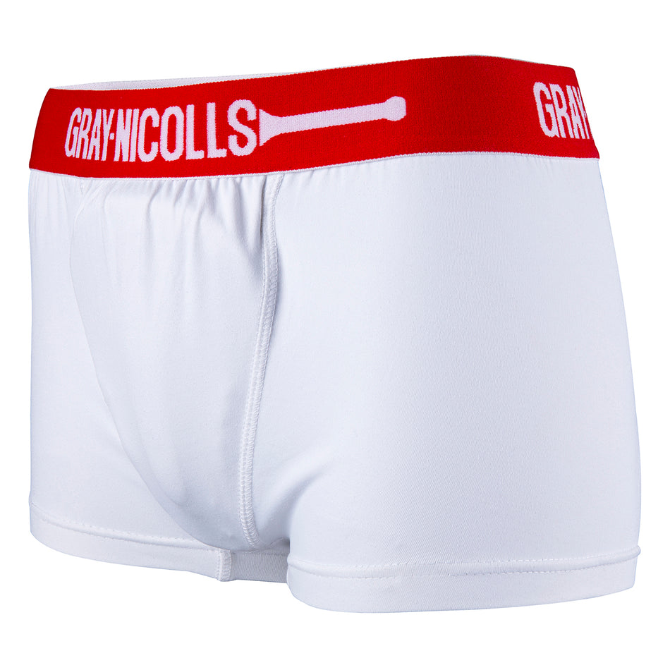 The Women's Cover Point Trunks by Gray Nicolls are white cricket underwear with a red waistband, showcasing the GRAY-NICOLLS logo and a white cricket bat graphic, presented on a plain background.