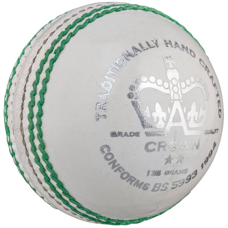 The Gray Nicolls Crown 2 Star Cricket Ball is made from premium Pakistani leather with green stitching, silver text, a crown logo, and "Traditionally Hand Crafted"—ideal for junior cricket and conforms to BS 5993:1994 standards.