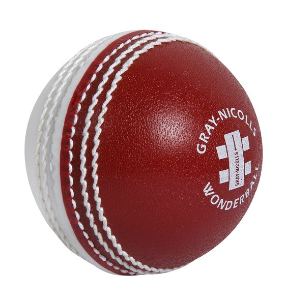 The Gray Nicolls Wonderball is a red/white cricket training ball with prominent stitching, ideal for catching practice.