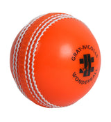 The Gray Nicolls Wonderball is an orange cricket training ball with white stitched seams and the Gray Nicolls logo, perfect for catching practice sessions.