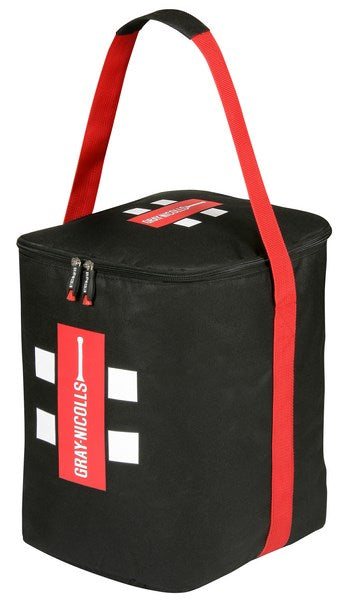 The Gray Nicolls Ball Bag is black with red handles and zipper, white squares, and a red GRAY-NICOLLS label. Designed for club training, it holds 40 balls—perfect for storing sports equipment or accessories.