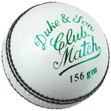 A white Dukes Club Match A Cricket Ball (Senior) with black stitching features “Duke & Son Club Match 156 gm” printed in green on the leather surface.