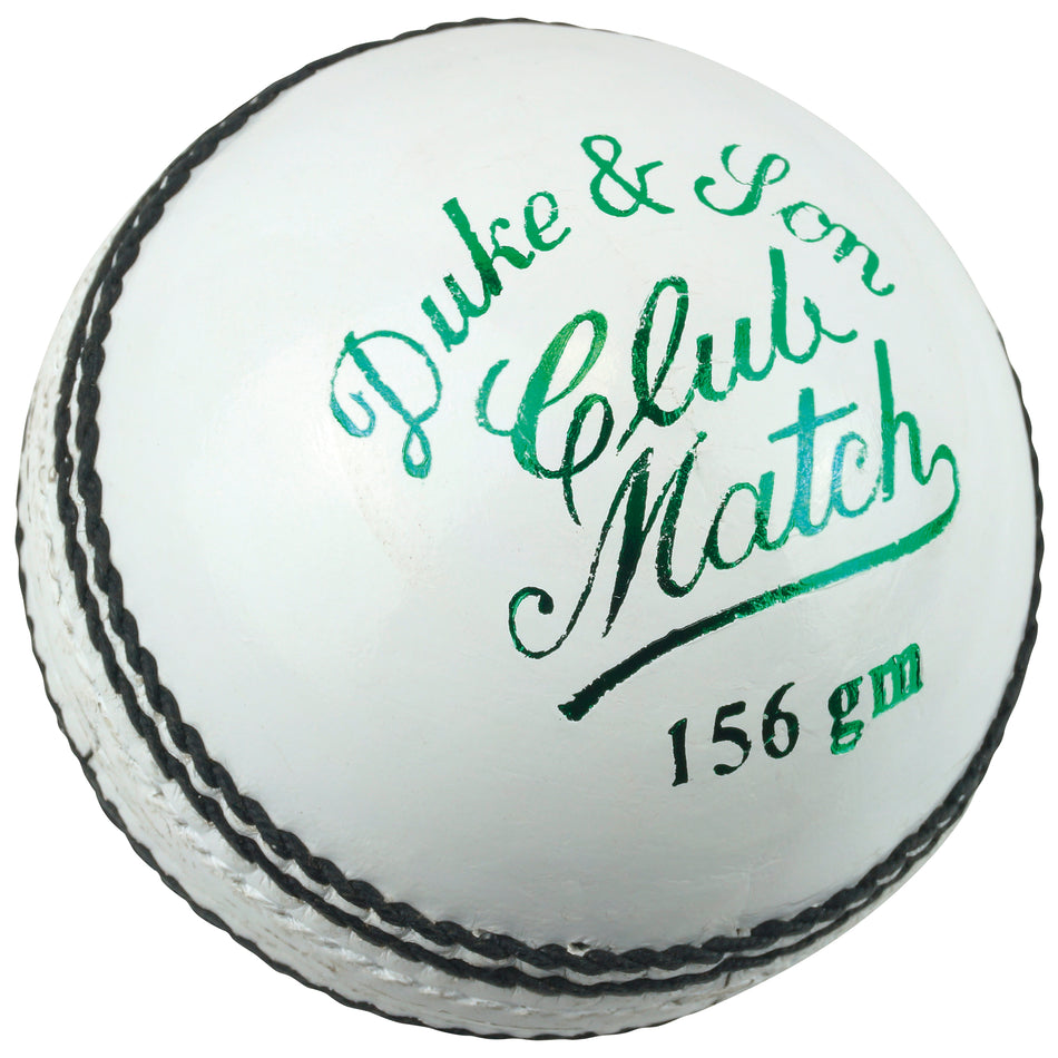 A white Dukes Club Match A Cricket Ball (Senior) with black stitching features “Duke & Son Club Match 156 gm” printed in green on the leather surface.