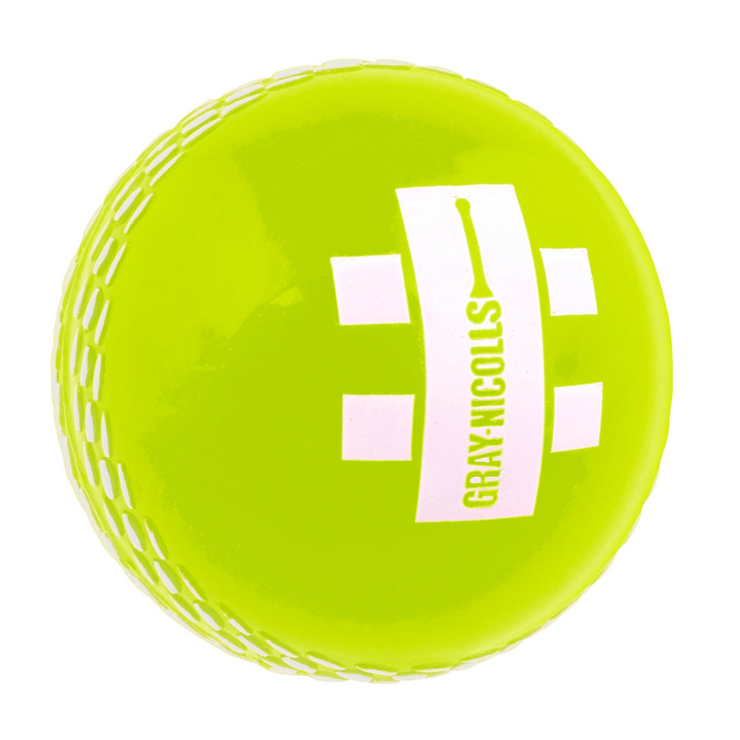 The Gray Nicolls PowerPlay Ball is a bright yellow junior cricket ball designed for soft-ball cricket, featuring white stitched seams and the Gray Nicolls logo printed in white on one side.