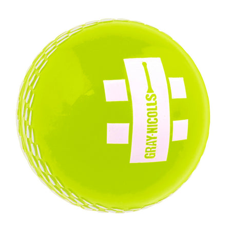 The Gray Nicolls PowerPlay Ball is a bright yellow junior cricket ball designed for soft-ball cricket, featuring white stitched seams and the Gray Nicolls logo printed in white on one side.