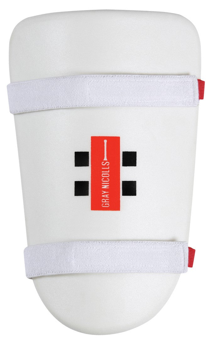 The Gray Nicolls Academy Thigh Pad offers essential cricket protection. Combine it with an abdominal guard for complete coverage. Features two elastic straps and a bold red and black Gray Nicolls logo in the center.