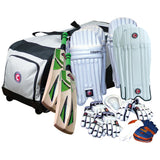 The Hunts County Junior Team Kit Bag includes two Hunts County bats, leg pads, batting gloves, wicketkeeping gloves, and an arm guard, all neatly arranged against a white background.