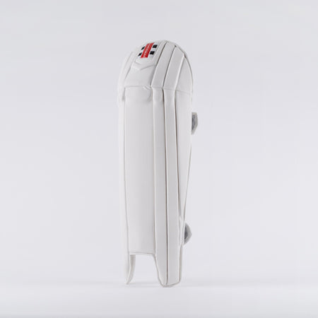 The Gray Nicolls Prestige Wicket Keeping Pads 2026 stands upright against a plain background, showcasing ergonomic knee design, detailed padding and stitching, and a small tricolor Gray Nicolls logo near the top.
