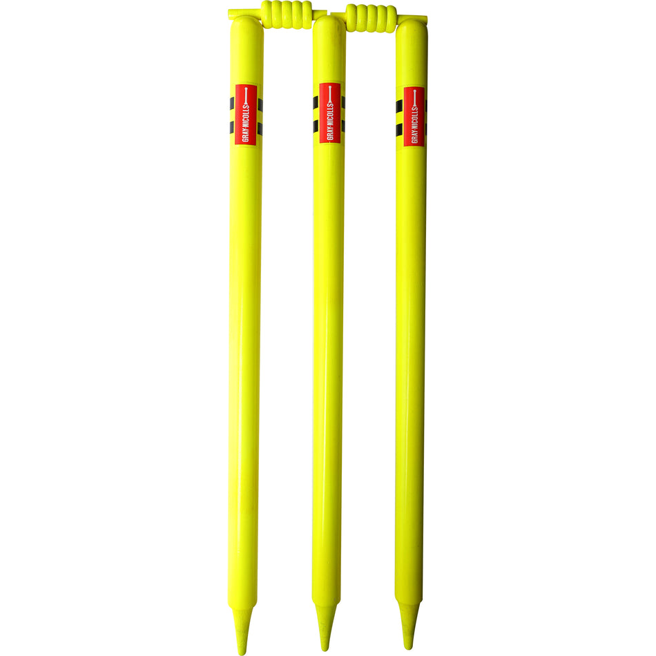 Three high-visibility Gray Nicolls Neon Stumps, featuring pointed ends, coiled tops, and a red label with white text near the top, stand vertically aligned—ideal for T20 cricket matches.