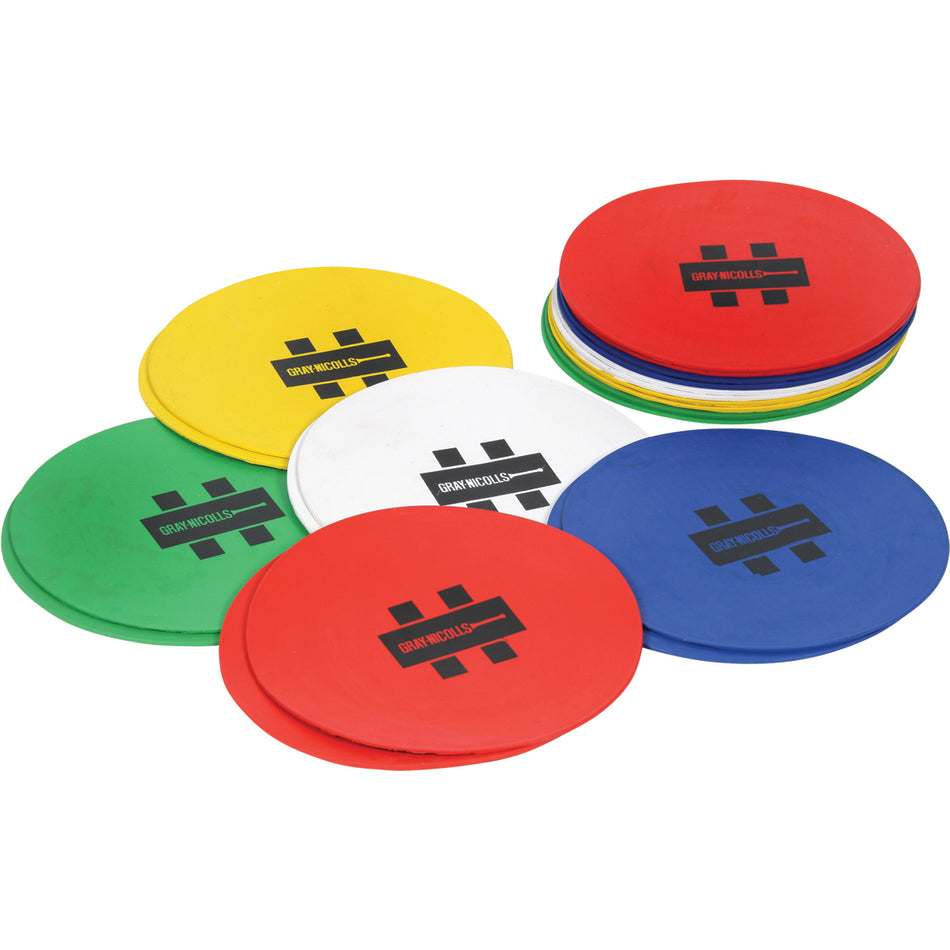 Gray Nicolls Sequencing Discs by Gray Nicolls are flat, round plastic markers in red, yellow, green, blue, and white—each labeled with a black hash and text. Use them spread out or stacked for zone marking or training drills.