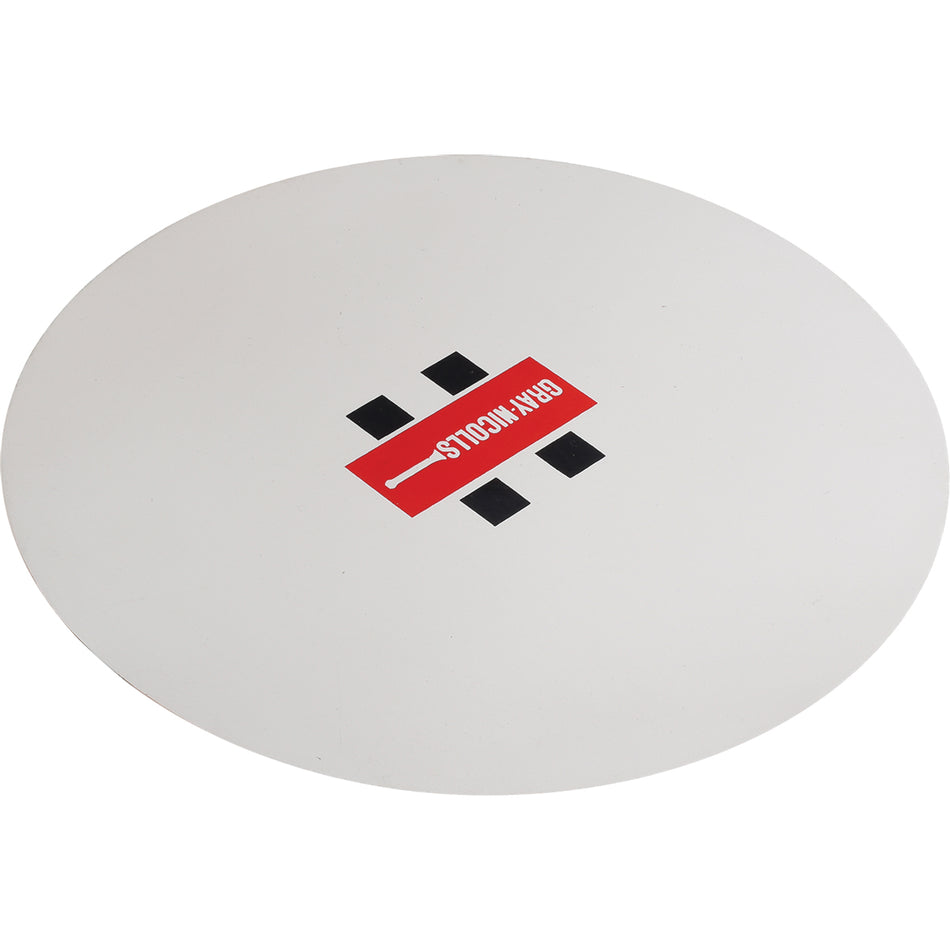 A round white food plate has a red and black rectangular "BAKA NOODLES" logo in the center, bordered by four black squares and a white line, resembling Gray Nicolls Fielding Discs by Gray Nicolls.
