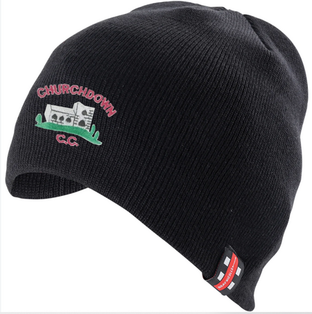 The Gray Nicolls Churchdown CC Beanie Hat is a warm acrylic beanie with an embroidered church, greenery, and "CHURCHDOWN C.C." in red and green on the front, plus a small red and white club logo tag on the edge.