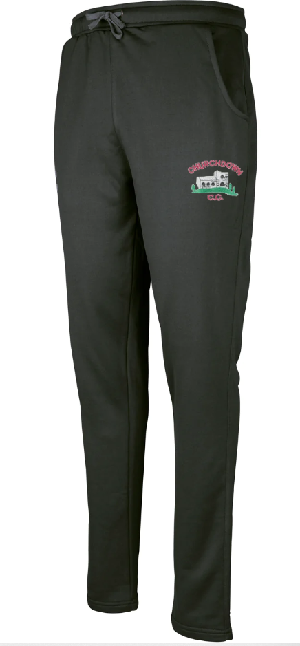 Gray Nicolls Churchdown CC Pro Performance Training Trousers feature a drawstring waist, side pockets, and a colorful embroidered club logo with a cricket-themed design on the left thigh, inspired by classic polyester cricket trousers.