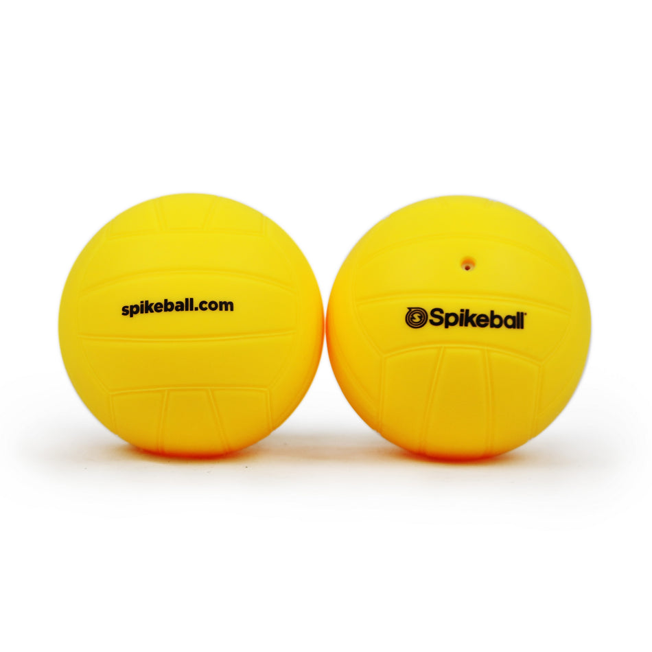 The Kankakee Spikeball Standard Replacement Balls (2 Pack) includes two bright yellow balls with black logos—ideal for refreshing your Spikeball Standard Set or upgrading your game. Shown against a white background.