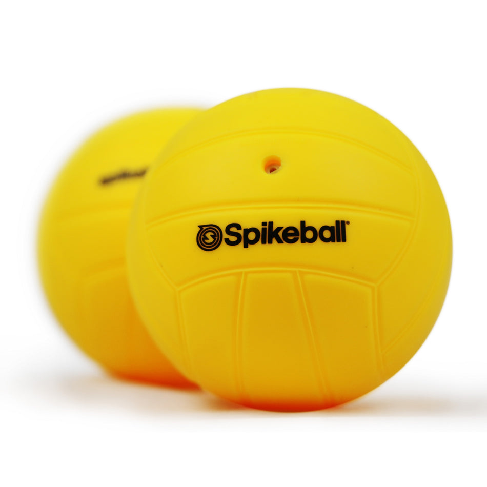The Kankakee Spikeball Standard Replacement Balls (2 Pack) feature two bright yellow balls with black logos and subtle panel lines—ideal for updating your Spikeball game set.