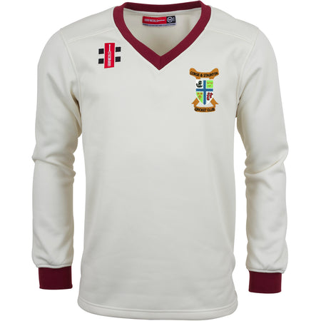 The Gray Nicolls Corse & Staunton CC Junior Pro Performance Sweater is a cream, long-sleeved top with maroon cuffs and V-neck, made from lightweight sport fabric, featuring a multicolored club crest and two patches on the chest.