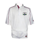 The Martin Berrill Sports Cowley CC 3/4 Sleeve Cricket Shirt features maroon piping, a maroon-trimmed collar, and Town Cricket Club Est. 1974 crest. Made from wick away fabric, it pairs with matching white trousers.