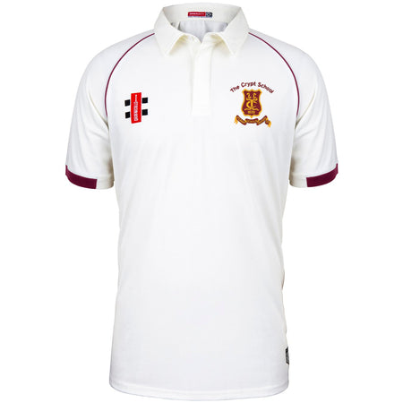 The Crypt School Matrix V2 Short Sleeve Match Shirt by Martin Berrill Sports is a white cricket shirt with maroon trim, The Crypt School emblem on the left chest, and a red-and-black patch on the right.