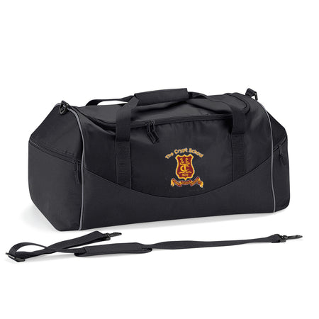 The Crypt School QS70 Holdall by Martin Berrill Sports is a black 55L bag with side pockets, short handles, a removable shoulder strap, and an embroidered "The Crypt School" logo on the front.